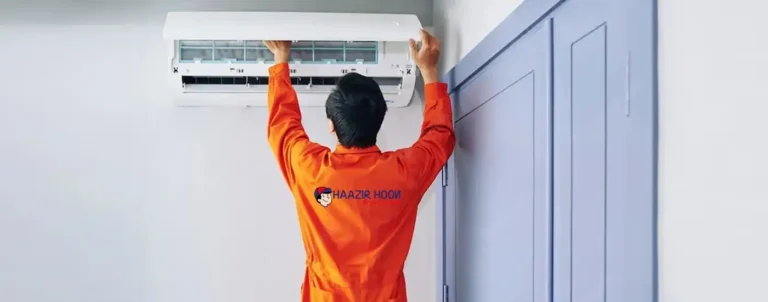 Technician performing AC gas refilling in Greater Noida